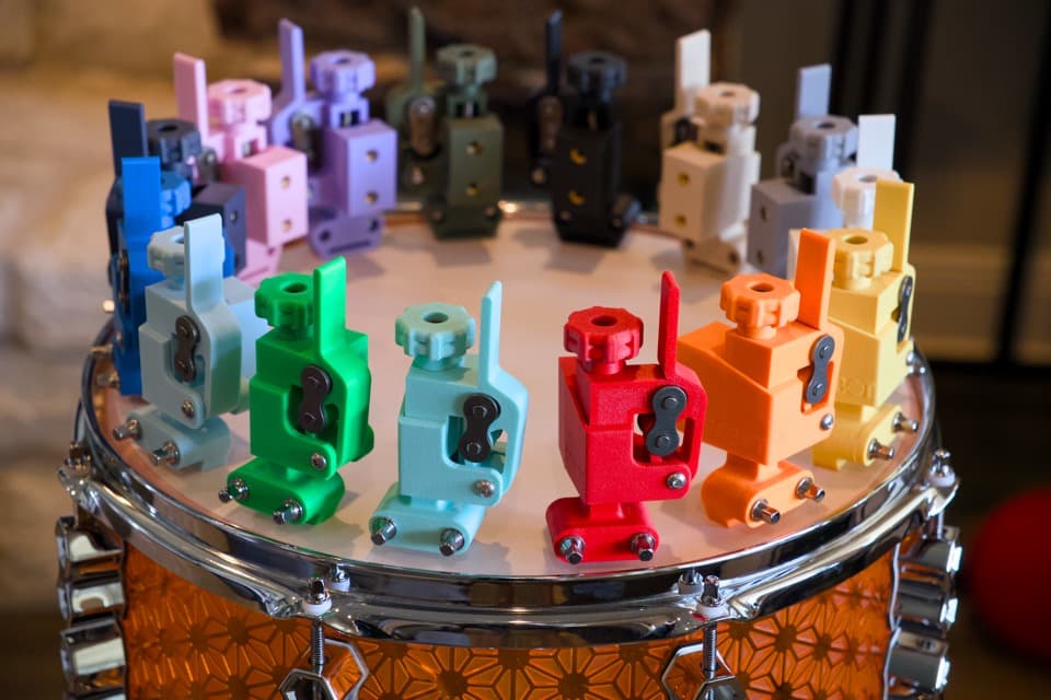 Colorful Robot hardware parts arranged on a drum shell.