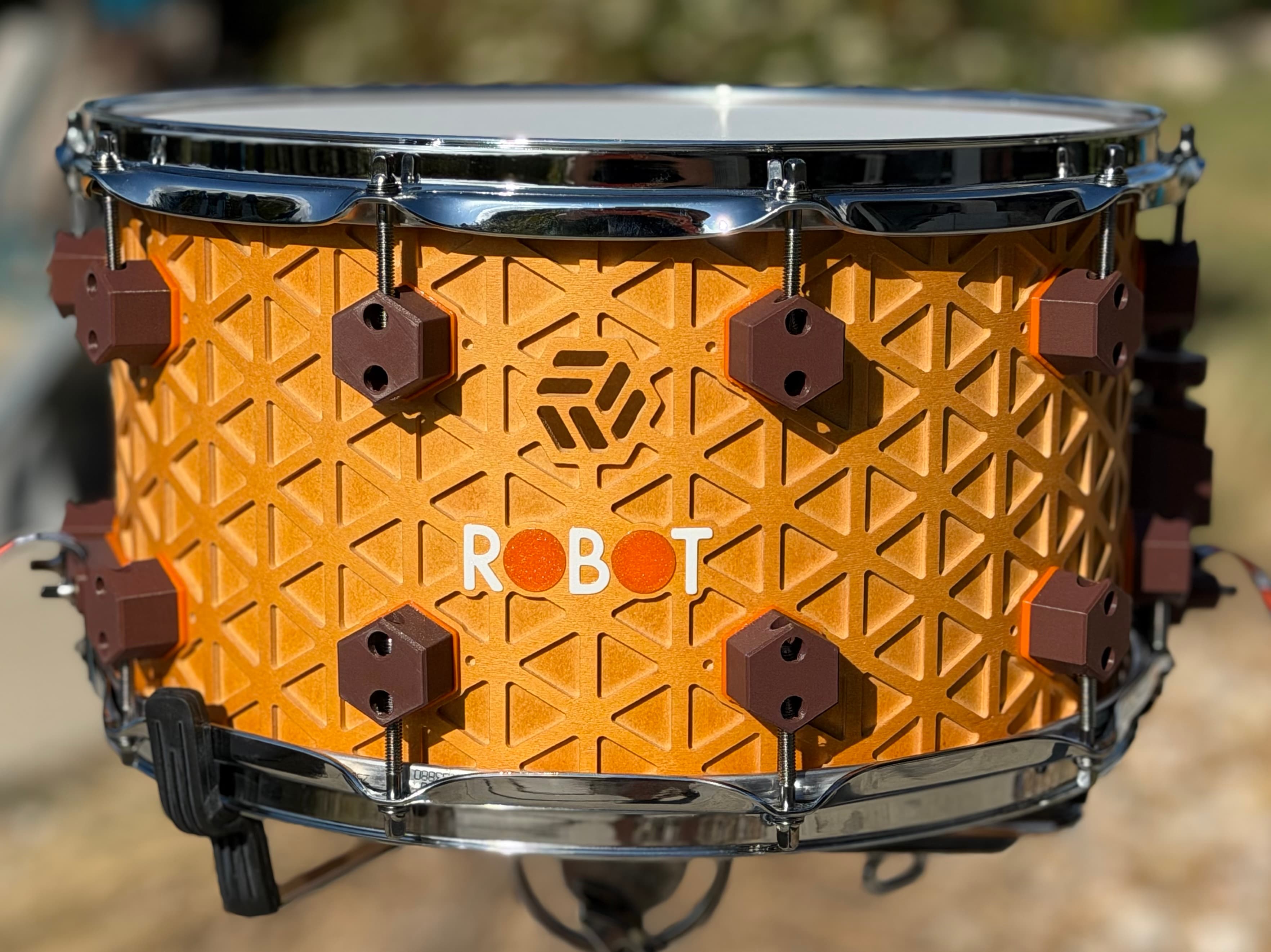 Kumiko Series snare in a Honey Wheat finish with an isogrid shell and chrome hardware.