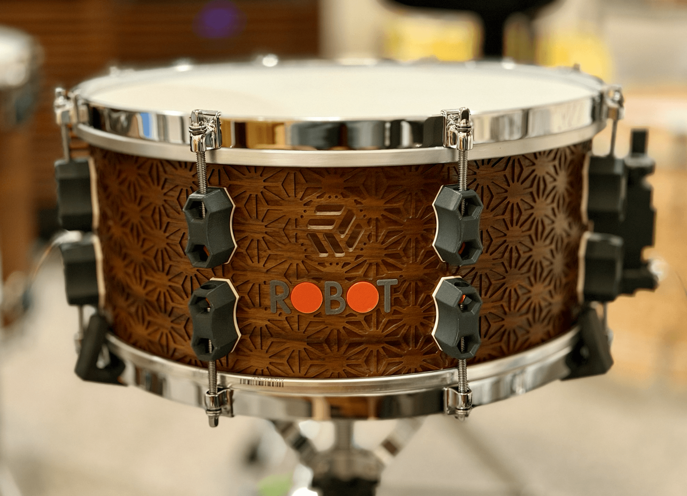 Asanoha Series snare with geometric shell machining and chrome hardware.