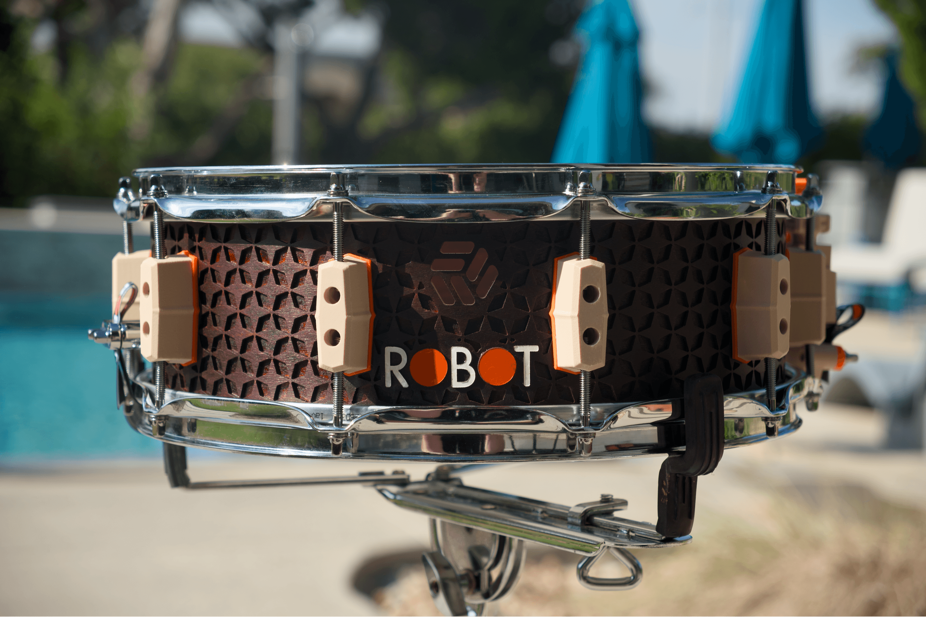 Shippo Series snare render in brown, tan, and orange Kaku Shippo geometry.